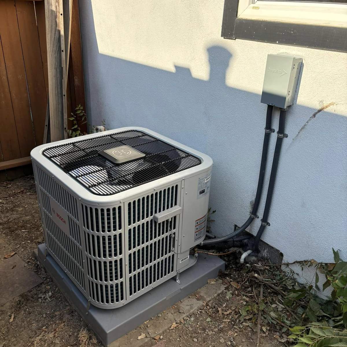 A new Bosch condenser installed beside a Sacramento home