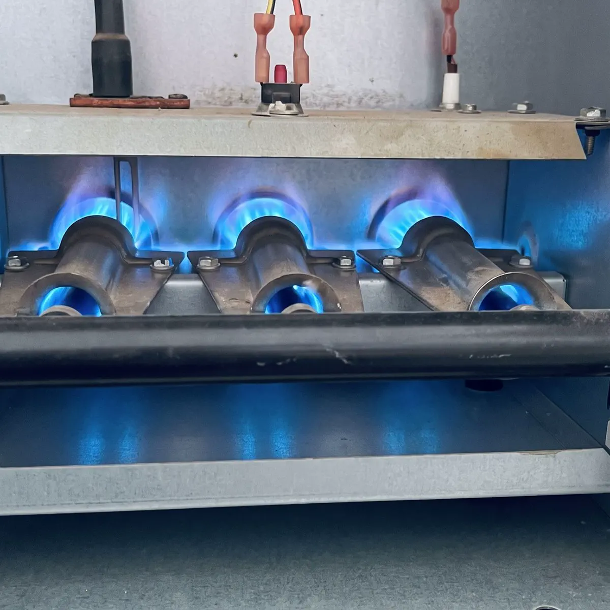 Furnace burners firing with a clean blue flame